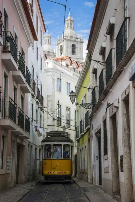 Framed Print : Famous tram 28 going through the old quarter of Alfama, Lisbon, Portugal, Europe
