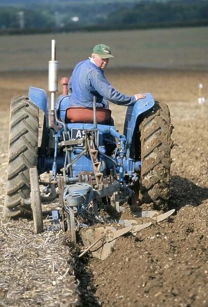 Farmer ploughing near Sonning Common, Oxfordshire, England, United Kingdom, Europe