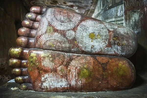 Feet of the reclining Buddha in Cave 1 (Cave of the Divine King) (Temple of the Divine King), Dambulla Cave Temples, UNESCO World Heritage Site, Dambulla, Sri Lanka, Asia