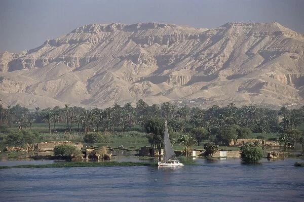 Felucca on the River Nile, looking towards Valley of the Kings, Luxor, Thebes