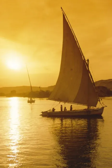 Framed Print : Feluccas under sail at sunset on the Nile river, Egypt Framed Print : Feluccas under sail at sunset on the Nile river, Egypt