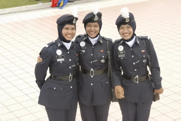 Framed Print : Three female police force members at celebrations of Framed Print : Three female police force members at celebrations of