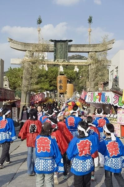 Festival goers at a torii gate at Hadaka matsuri (Naked Festival), Hofu city