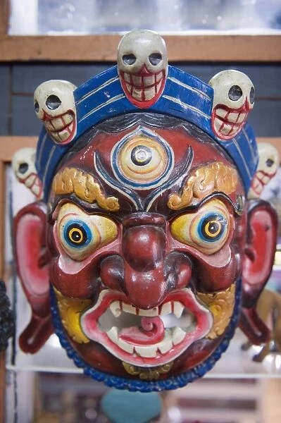 Festival mask in a souvenir shop, Bhutan, Asia