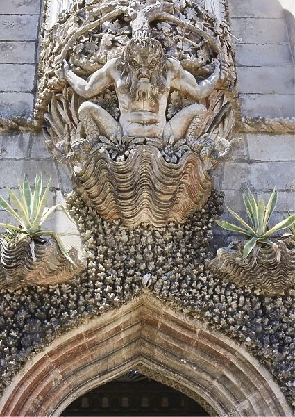 Fierce gargoyle above archway, Pena National Palace, UNESCO World Heritage Site
