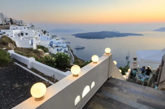 Framed Print : The fiery red sky on the Aegean Sea after sunset seen from the typical terraces of Firostefani Framed Print : The fiery red sky on the Aegean Sea after sunset seen from the typical terraces of Firostefani