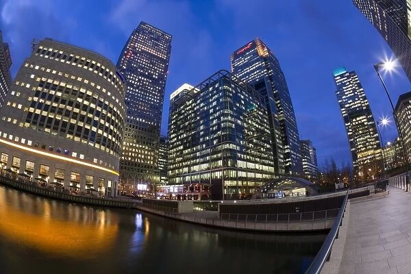 Financial District office buildings illuminated at dusk, Canary Wharf, London