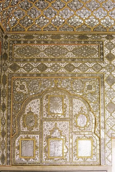 Detail of the fine mirror and plaster work found in the Sheesh Mahal