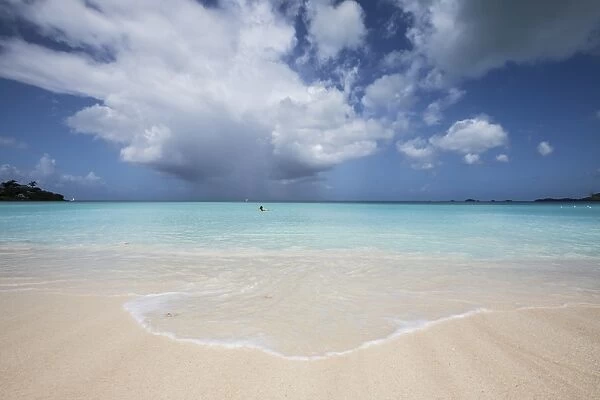 Fine white sand surrounded by the turquoise water of the Caribbean sea, The Nest