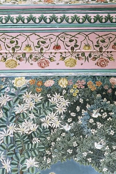 Detail of the finely painted walls in one of the bedroom suites