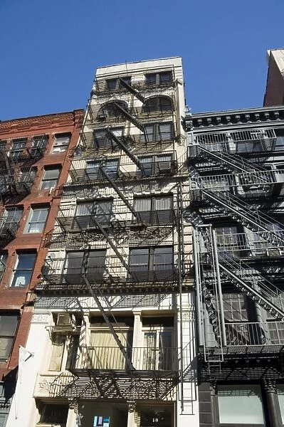 Fire escapes on the outside of buildings in Spring Street