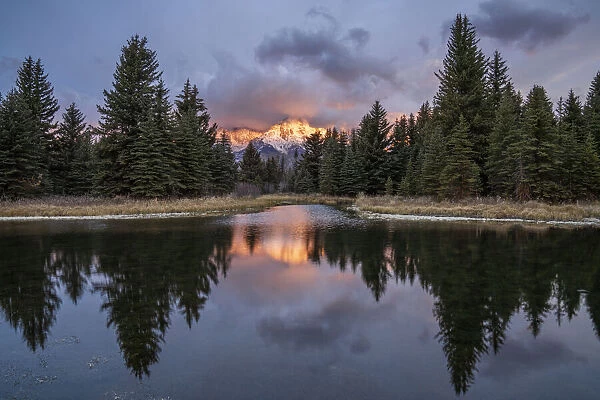 First light on the Grand Tetons with reflection at Schwabachers Landing