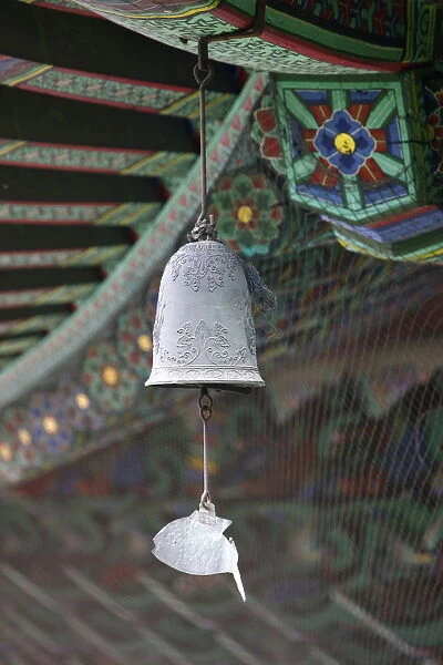 The fish-shaped chime on the Buddhist wind bell, honors those creatures which never close