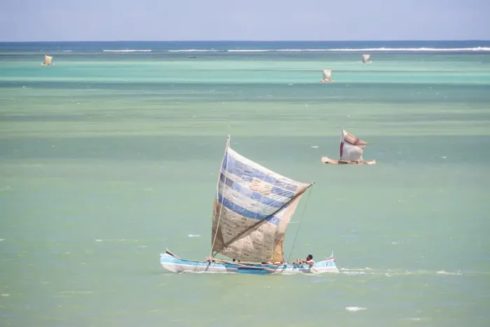 Framed Print : Fisherman fishing from a Pirogue, a traditional Madagascar sailing boat, Ifaty, Madagascar Framed Print : Fisherman fishing from a Pirogue, a traditional Madagascar sailing boat, Ifaty, Madagascar