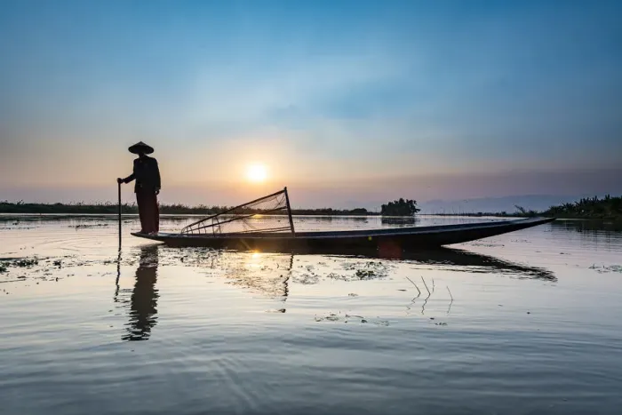 Framed Print : Fisherman at Inle Lake with traditional Intha conical net at sunset, fishing net Framed Print : Fisherman at Inle Lake with traditional Intha conical net at sunset, fishing net