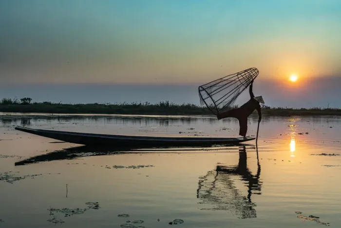 Framed Print : Fisherman at Inle Lake with traditional Intha conical net at sunset, fishing net Framed Print : Fisherman at Inle Lake with traditional Intha conical net at sunset, fishing net