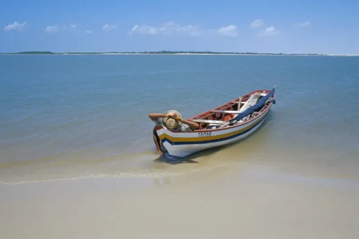 Framed Print : Fisherman resting on his boat, Parque Nacional dos Lencois Maranhenses Framed Print : Fisherman resting on his boat, Parque Nacional dos Lencois Maranhenses