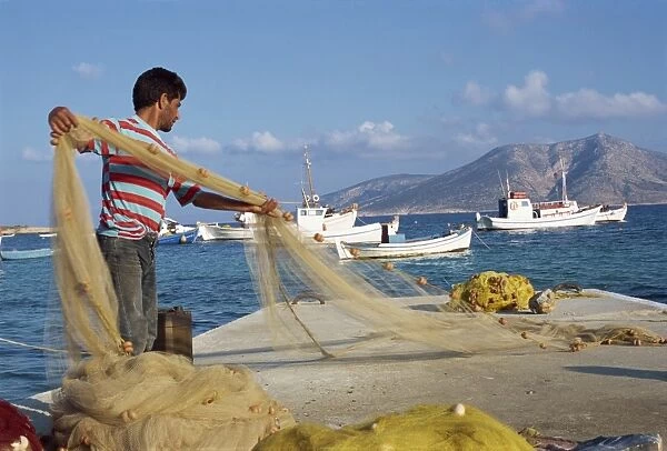 Fisherman sorting his nets