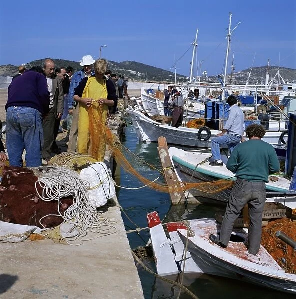 Fishermen mending nets