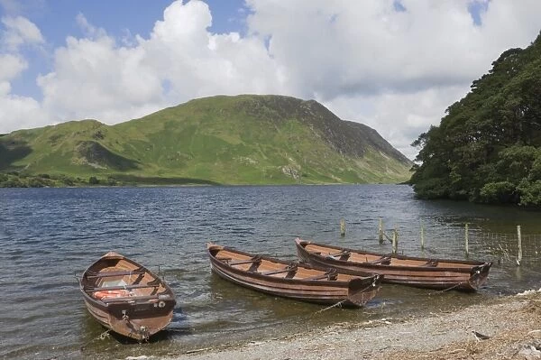 Fishermens boats on Crummock Water, Lingmell Fell in background, Lake District National Park