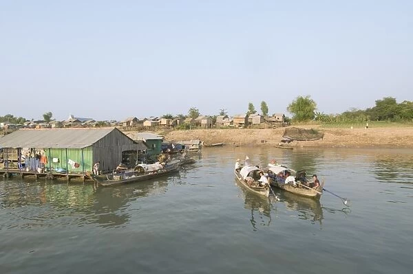 Fishermens floating house on the Mekong River, Phnom Penh, Cambodia