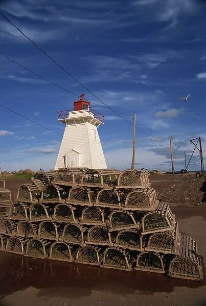 Fishing baskets and lighthouse on Prince Edward Island, Canada, North America