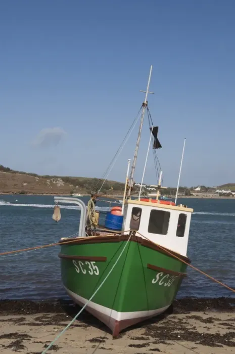 Framed Print : Fishing boat on Bryer with Tresco in background, Isles of Scilly, United Kingdom, Europe