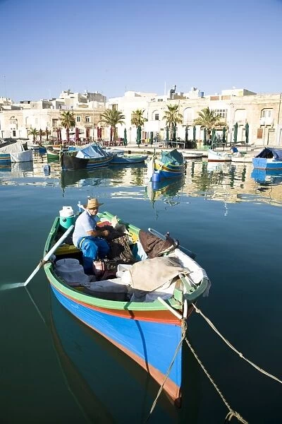 Fishing boat in the harbour in Marsaxlokk, Malta, Mediterranean, Europe