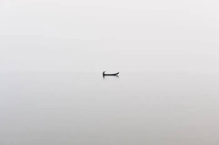 Framed Print : A fishing boat on a perfectly calm Indawgyi Lake in northern Myanmar on a misty afternoon Framed Print : A fishing boat on a perfectly calm Indawgyi Lake in northern Myanmar on a misty afternoon