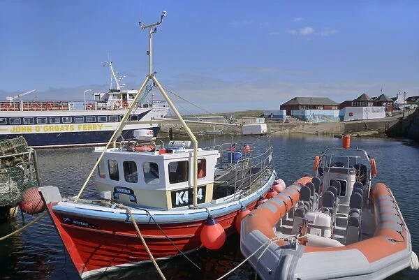 Fishing boat and rigid-inflatable boat in the harbour, John O Groats, Caithness, Highland Region, Scotland, United Kingdom, Europe