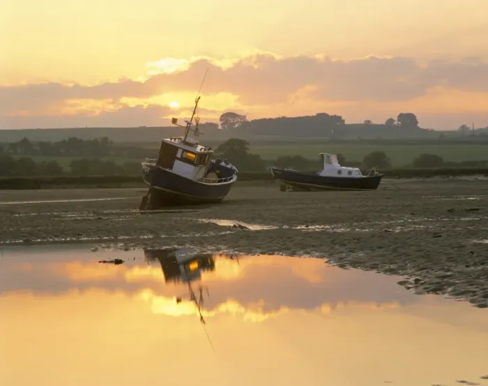 Framed Print : Fishing boat at sunset on the Aln estuary at low tide, Alnmouth, Northumberland Framed Print : Fishing boat at sunset on the Aln estuary at low tide, Alnmouth, Northumberland