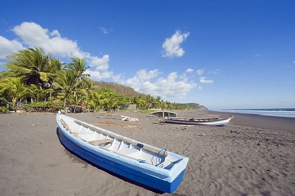 Fishing boats on the beach at Playa Sihuapilapa, Pacific Coast, El Salvador
