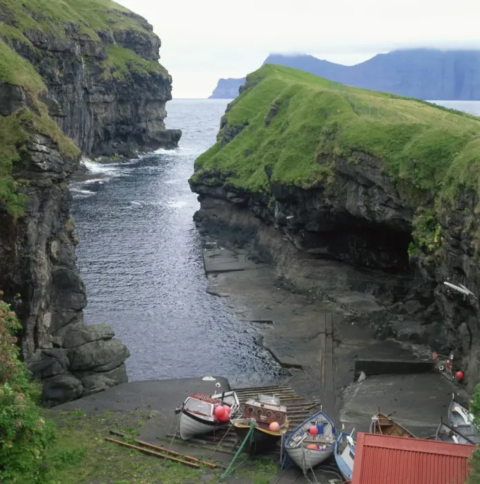 Framed Print : Fishing boats in a cove at Gjogv, Estoroy Island, Faroe Islands, Denmark, Europe Framed Print : Fishing boats in a cove at Gjogv, Estoroy Island, Faroe Islands, Denmark, Europe