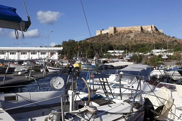 Fishing boats in the harbour and the 6th century Byzantine Fortress in the background