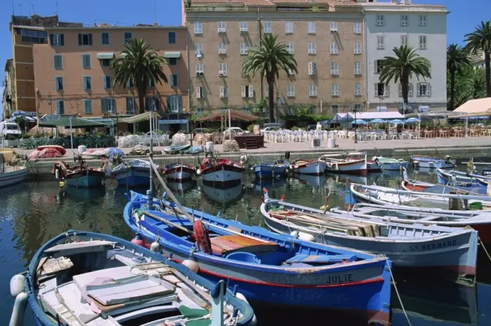 Framed Print : Fishing boats moored in the harbour and waterfront at Ajaccio, island of Corsica Framed Print : Fishing boats moored in the harbour and waterfront at Ajaccio, island of Corsica