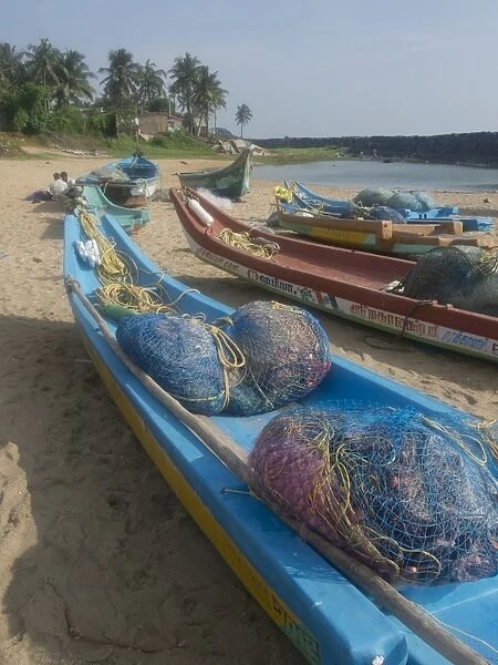 Fishing boats and nets on the beach at the French union territory of Pondicherry