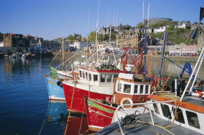 Framed Print : Fishing boats and waterfront with McCaigs Tower on hill Framed Print : Fishing boats and waterfront with McCaigs Tower on hill