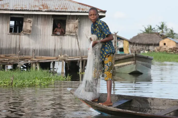 Framed Print : Fishing in Ganvie lake village on Nokoue Lake, Benin, West Africa, Africa