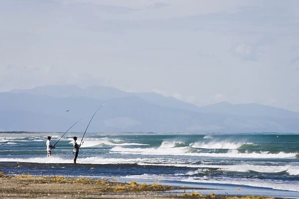 Fishing from the shore, Manawatu, west coast of the North Island, New Zealand, Pacific