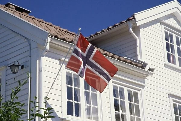 Flag on house, Lillesand, south coast, Norway, Scandinavia, Europe