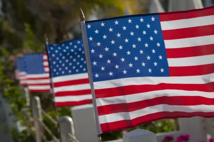 Framed Print : US flags attached to a fence in Key West, Florida, United States of America Framed Print : US flags attached to a fence in Key West, Florida, United States of America