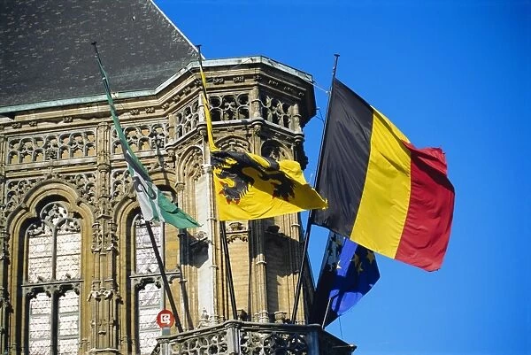 Flags of Belgium on the right, Flanders in the center on the town hall of Ghent