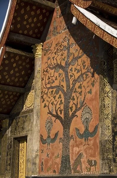 Flame tree mosaic on back wall, main temple, Wat Xieng Thong, UNESCO World Heritage Site, Luang Prabang, Laos, Indochina, Southeast Asia, Asia