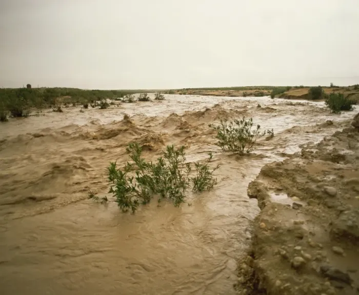 Framed Print : Flash flood in oued (river bed) in normally dry Algerian Sahara region Framed Print : Flash flood in oued (river bed) in normally dry Algerian Sahara region