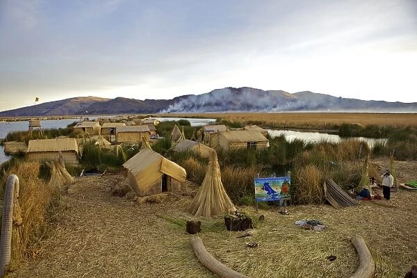 Floating islands of the Uros people, traditional reed boats and reed houses, Lake Titicaca, peru, peruvian, south america, south american, latin america, latin american South America