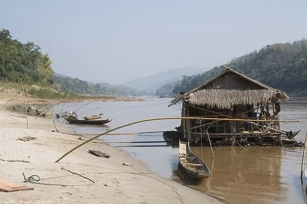 Floating shop on Mekong River, near village, Laos, Indochina, Southeast Asia, Asia