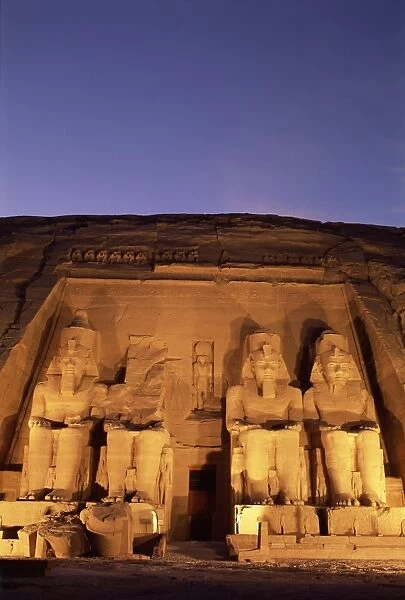 Floodlit temple facade and colossi of Ramses II (Ramesses the Great), Abu Simbel