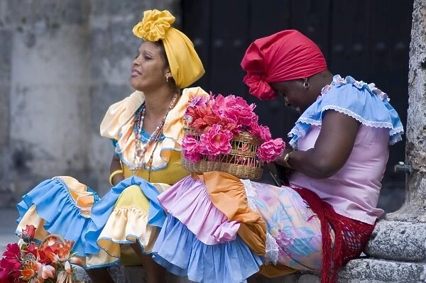 Flower girls in Plaza de la Catedral, Habana Vieja, Havana, Cuba, West Indies