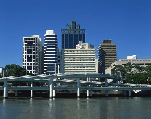 Flyovers above the Brisbane River and the city skyline behind, in Brisbane