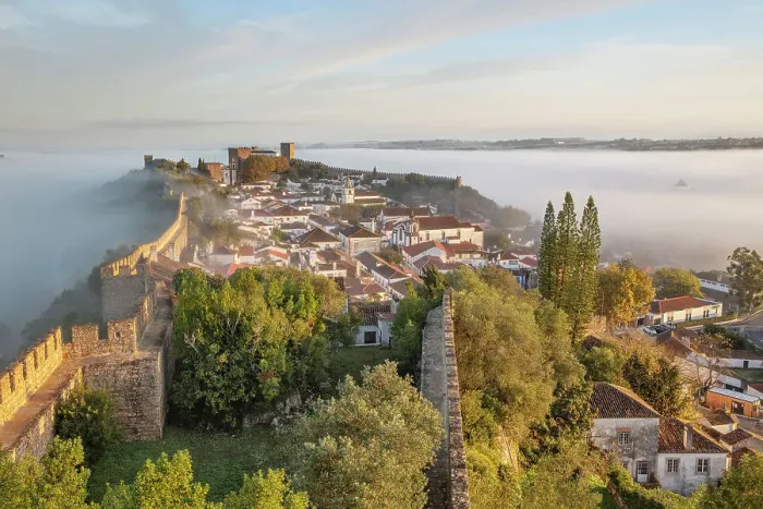 Framed Print : Fog at sunrise over Obidos old town and rampart defensive walls, Obidos, Centro Region, Estremadura, Portugal, Europe Framed Print : Fog at sunrise over Obidos old town and rampart defensive walls, Obidos, Centro Region, Estremadura, Portugal, Europe
